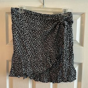 GB front wrap skirt in black and white. Size M.